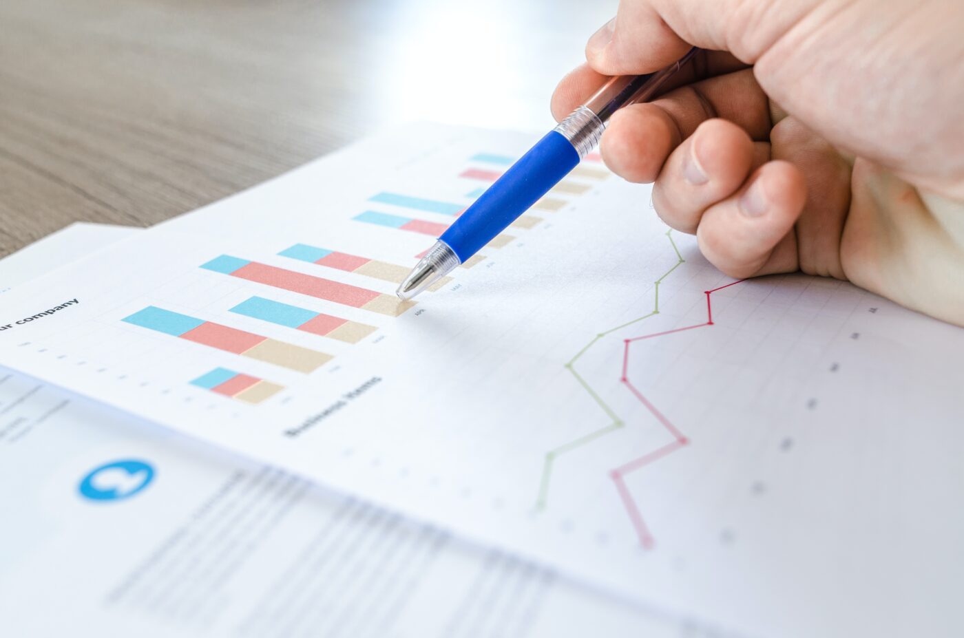 A business person is reviewing data from outdated surveys.